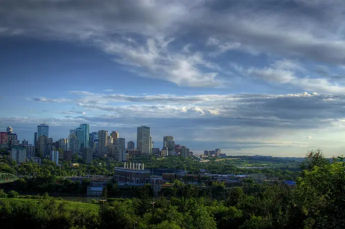 Edmonton skyline at sunset representing professional commercial pest management and sustainable business environments